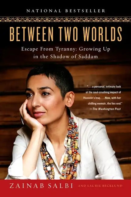 Between Two Worlds: Escape from Tyranny: Growing Up in the Shadow of Saddam - Paperback