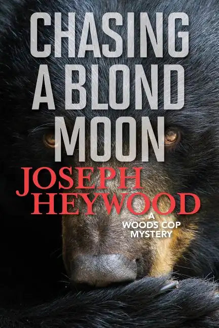 Chasing a Blond Moon: A Woods Cop Mystery - Paperback