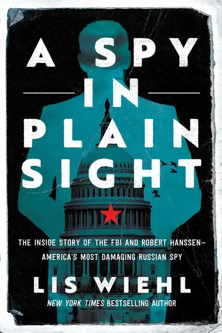 A Spy in Plain Sight: The Inside Story of the FBI and Robert Hanssen--America's Most Damaging Russian Spy - Paperback