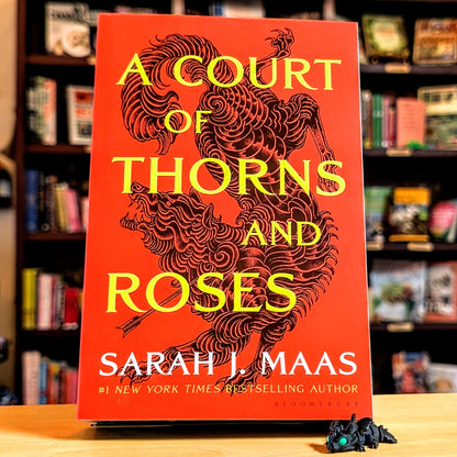 A Court of Thorns and Roses (A Court of Thorns and Roses, 1)